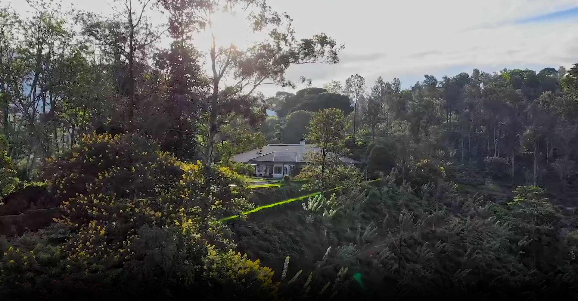 Nine Skies, a hill country hotel in Sri Lanka, offering stunning mountain views, surrounded by lush green hills in Ella